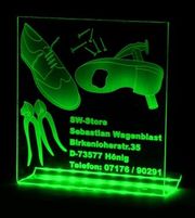 Shoemaker sign with company name text demand