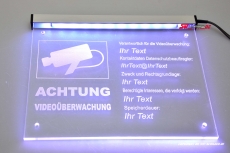 LED illuminating sign - video surveillance engraved