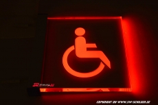 LED illuminated sign WC wheelchair user pictogram engraved Cantilever visible on both sides