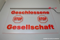 stop closed society sign engraved with indirect LED lighting