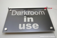 LED illuminated sign DARKROOM IN USE engraved with indirect LED lighting Modern design